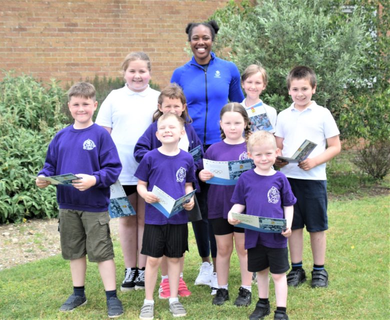 Montell Douglas with children from The Bishop's CE Primary Academy - Credit DNEAT