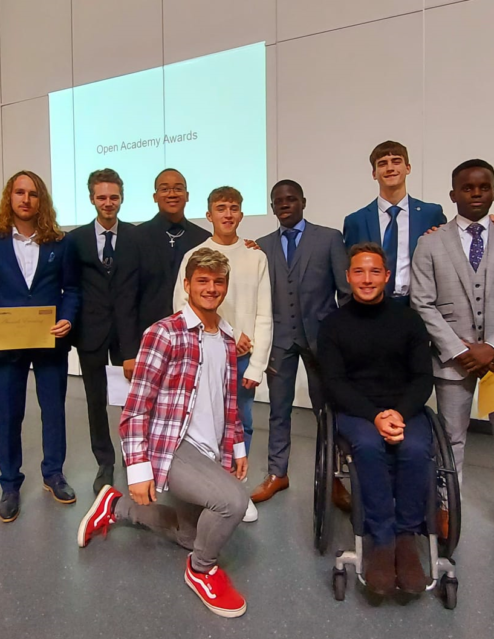 Alfie Hewett with a group of year 11 students who left last year Credit DNEAT