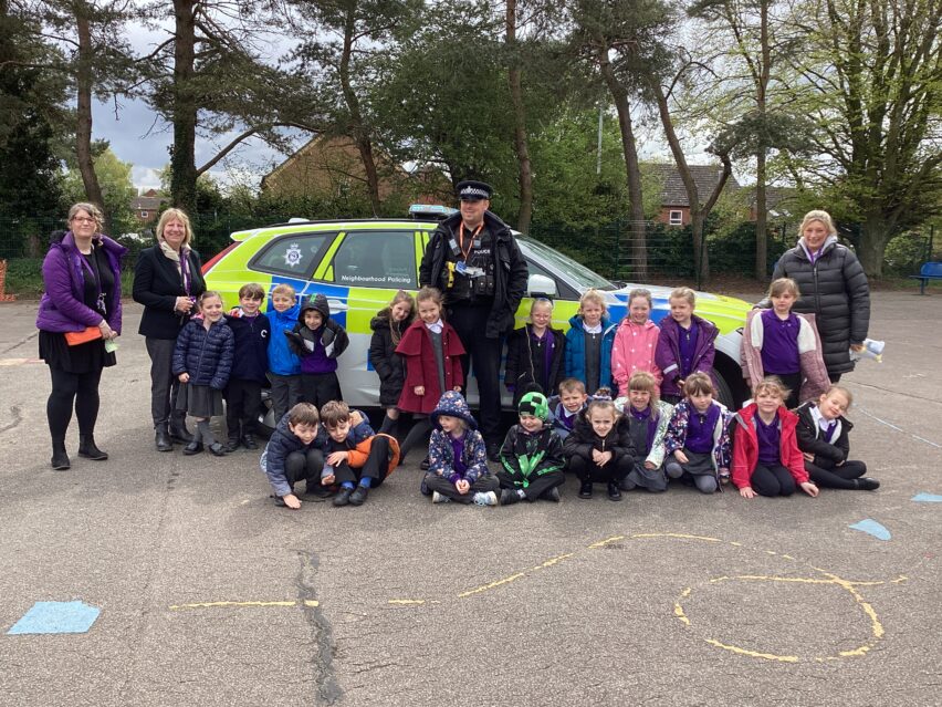Some of the Year 1 pupils and staff from Swaffham with PC Johnson
